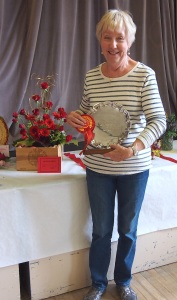 Frances Johnson with her arrangement and trophy