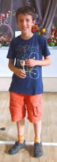 Owen Sage with one of his cups; with the most points over all classes he took the overall winner trophy